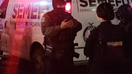 policías en escena del crimen